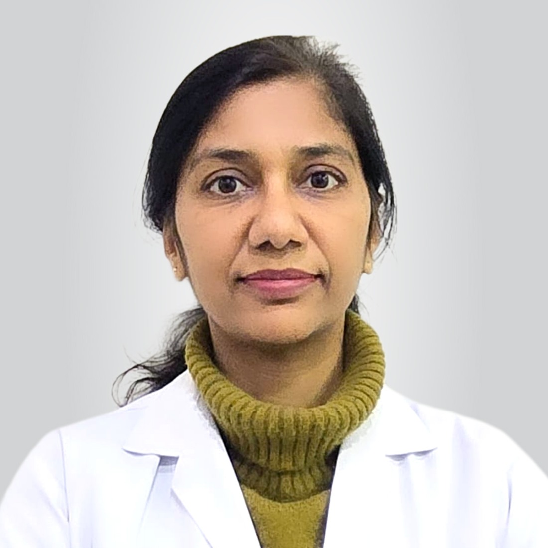 Dr. Neha